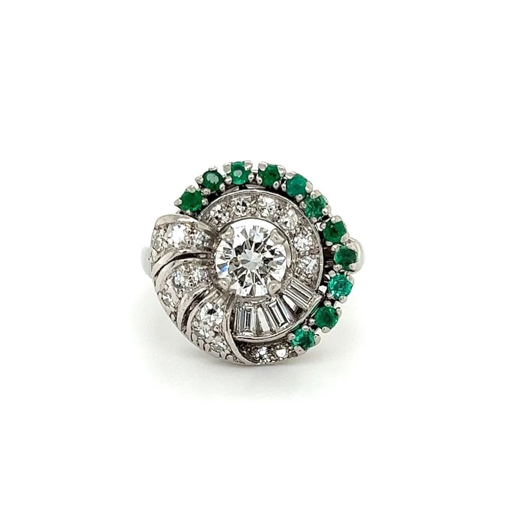 Platinum Retro Ring with Diamonds Emeralds and baguettes