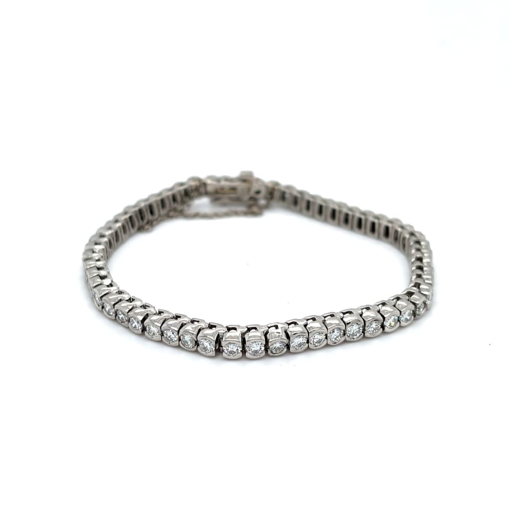 4 CTTW NATURAL DIAMOND HALF BEZEL TENNIS BRACELET IN PLATINUM AT REGARD JEWELRY IN AUSTIN, TEXAS - Regard Jewelry