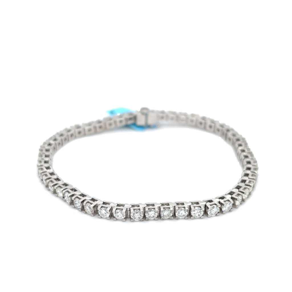 6.02 CTTW NATURAL DIAMOND TENNIS BRACELET SET IN 14 KARAT WHITE GOLD AT REGARD JEWELRY IN AUSTIN, - Regard Jewelry