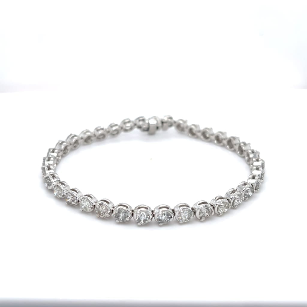 7.00 CTTW NATRUAL DIAMOND 3 PRONG TENNIS BRACELET SET IN 14 KARAT WHITE GOLD AT REGARD JEWELRY IN - Regard Jewelry