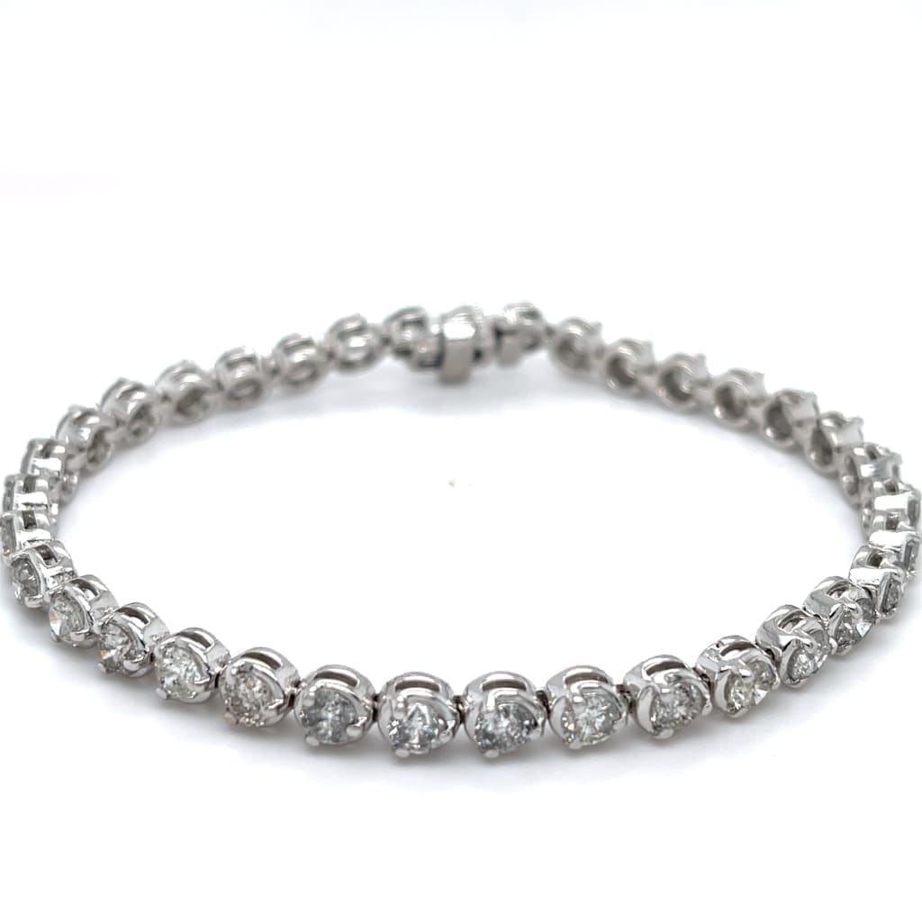 7.00 CTTW NATRUAL DIAMOND 3 PRONG TENNIS BRACELET SET IN 14 KARAT WHITE GOLD AT REGARD JEWELRY IN - Regard Jewelry