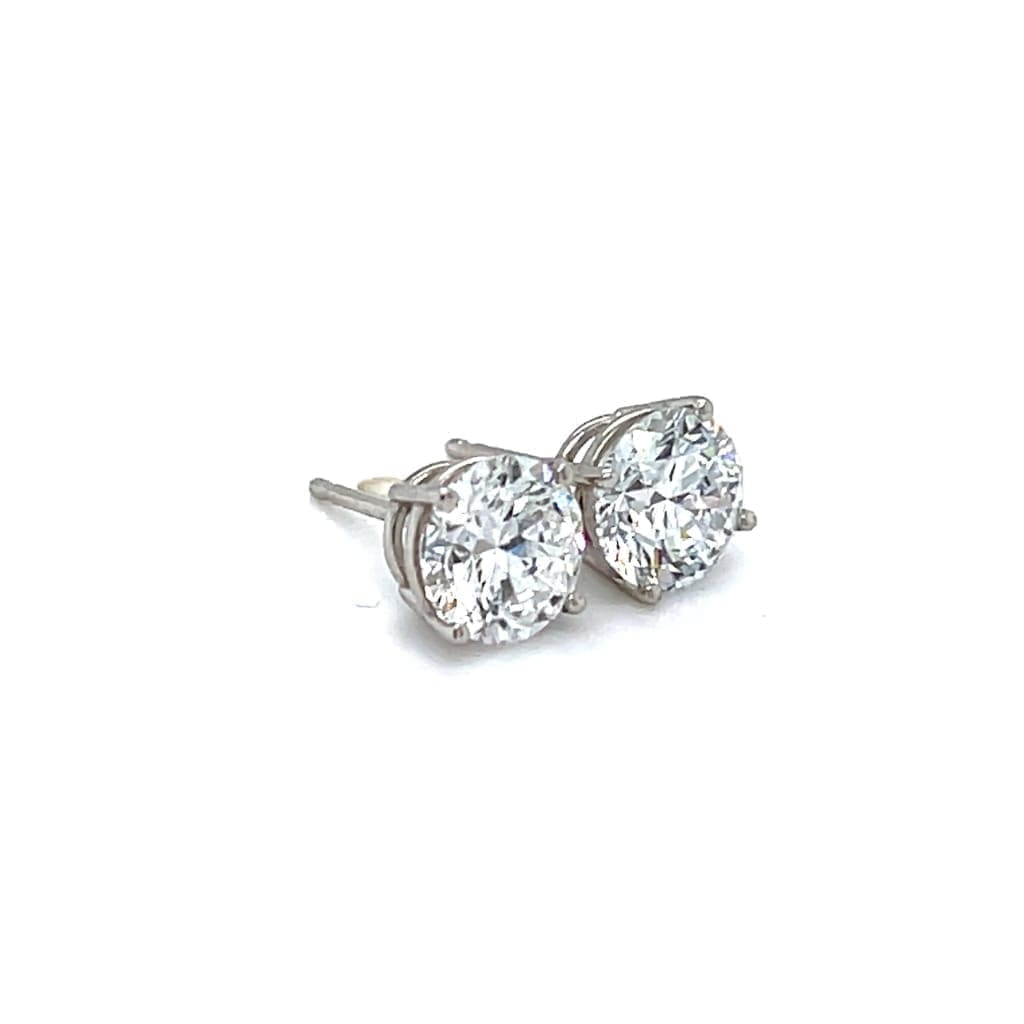 .97 CTTW NATURAL DIAMOND EARRINGS SET IN 14K WHITE GOLD AT REGARD JEWELRY IN AUSTIN, TX. - Regard Jewelry