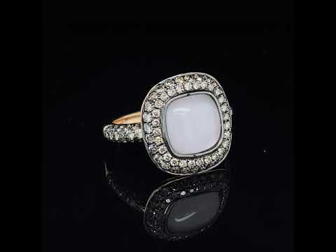 MOTHER OF PEARL RING WITH .95 CTTW ACCENT DIAMONDS SET IN 18 KARAT ROSE GOLD RING AT REGARD JEWELRY