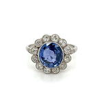 Platinum Ring With Oval Sapphire and Diamond Halo at Regard