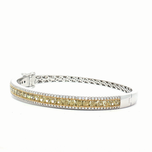 Fancy Yellow Diamond Bangle Bracelet in White Gold at Regard Jewelry Austin Texas