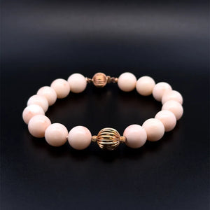 14K Yellow Gold 10mm Round Angel Skin Coral & Gold Bead Bracelet 8" | Regard Jewelry Austin Texas