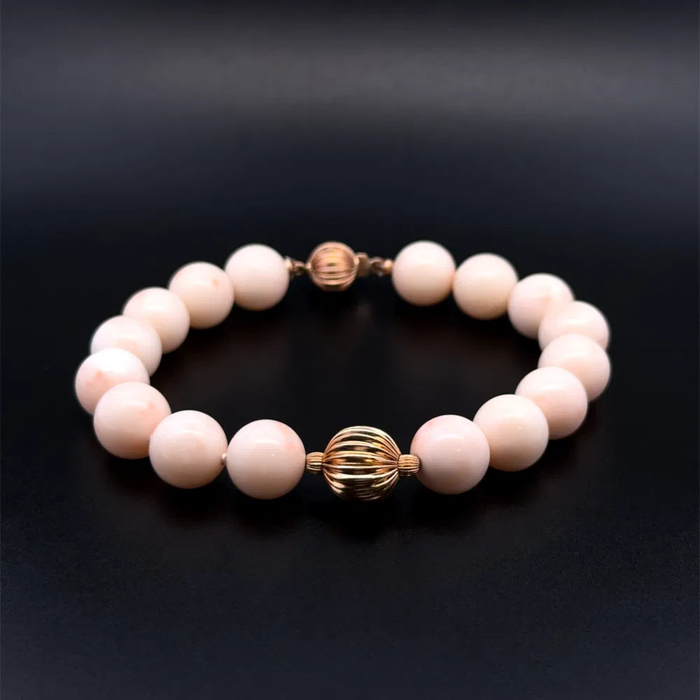 14K Yellow Gold 10mm Round Angel Skin Coral & Gold Bead Bracelet 8" | Regard Jewelry Austin Texas