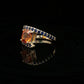 Natural Orange Sapphire Set In 14k Yellow Gold With Blue Sapphire Accent Stones. Regard Jewelry Austin Texas