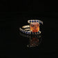 Natural Orange Sapphire Set In 14k Yellow Gold With Blue Sapphire Accent Stones. Regard Jewelry Austin Texas