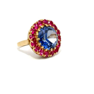 Blue And Red Gemstones On A Gold Ring - Gemstone Rings