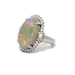 Load image into Gallery viewer, Oval Opal Surrounded By Diamonds - Ring
