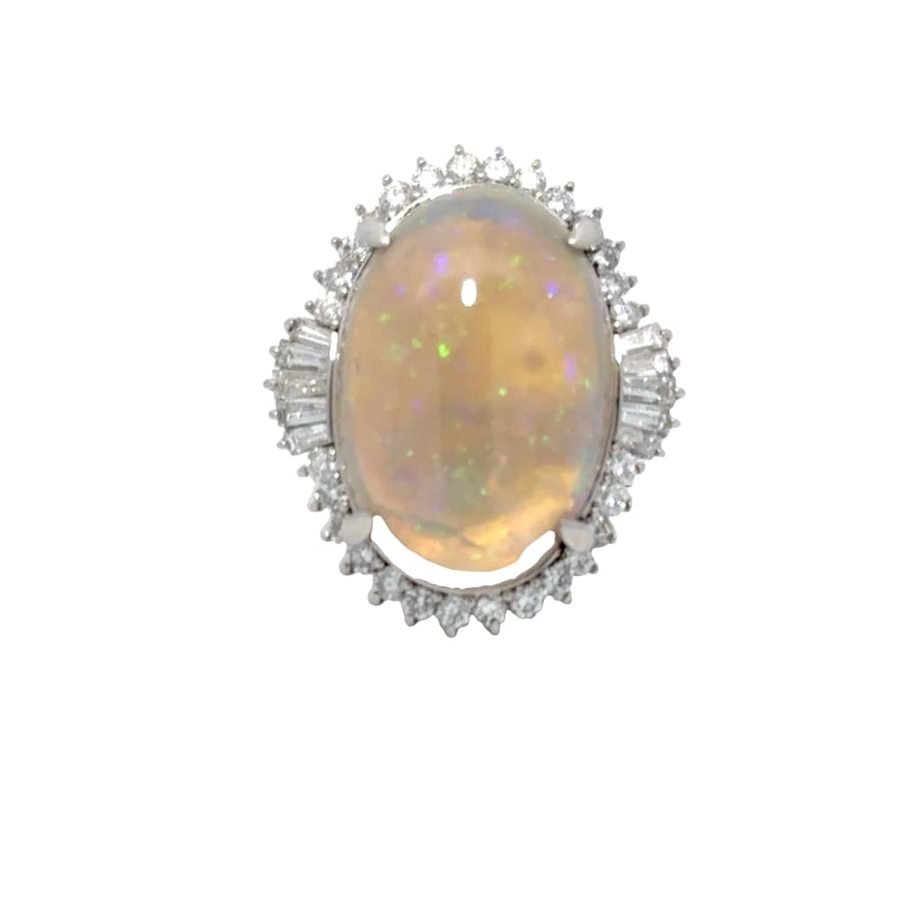 Oval Opal Surrounded By Diamonds - Ring