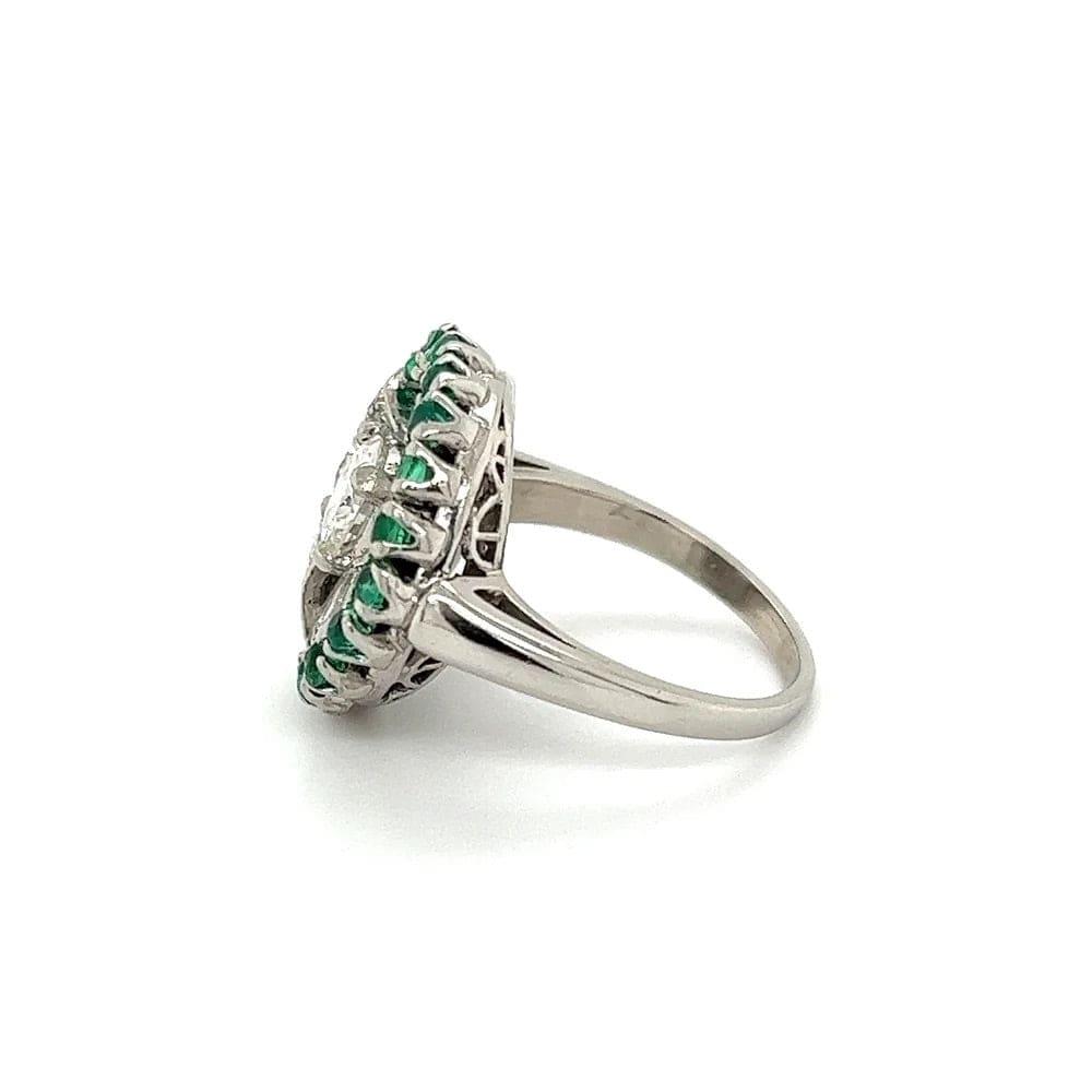 Platinum Retro Ring with Diamonds Emeralds and baguettes