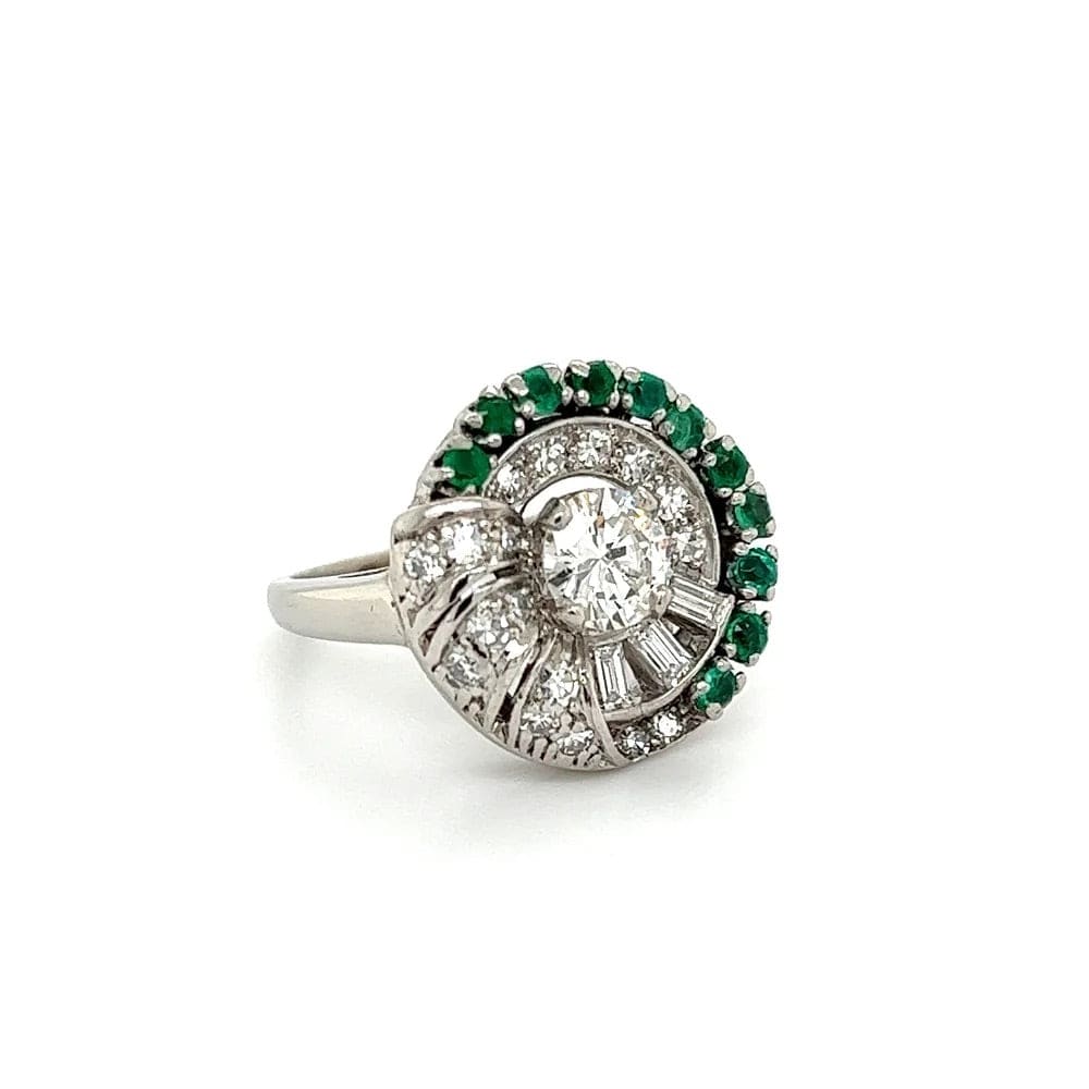 Platinum Retro Ring with Diamonds Emeralds and baguettes