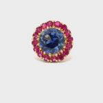 Load and play video in Gallery viewer, Blue And Red Gemstones On A Gold Ring
