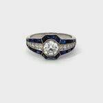 Load and play video in Gallery viewer, Estate Platinum Diamond Ring With Center Diamind and Sapphire Accents Regard Jewelry Austin Texas
