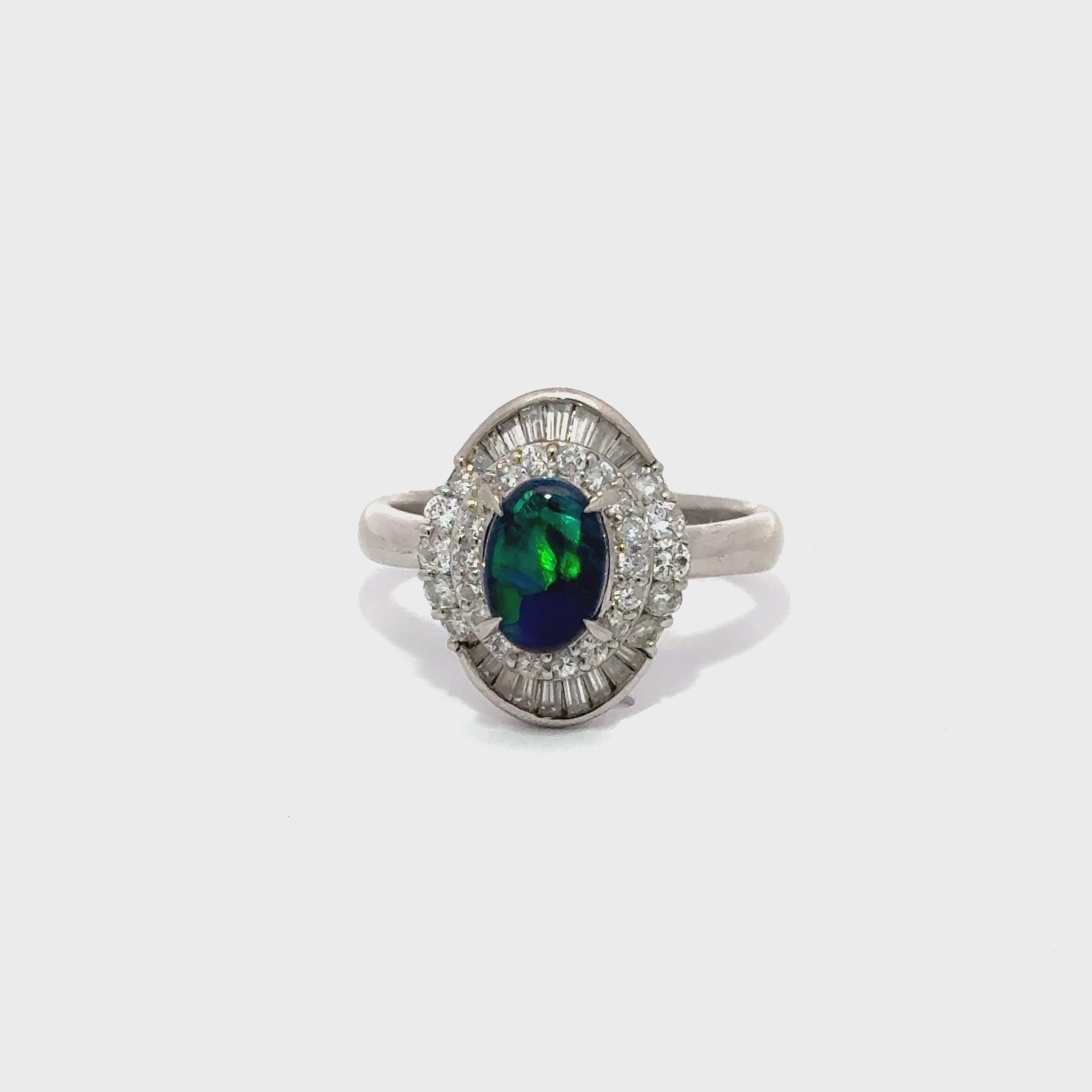 Black Opal With A Halo Of Diamonds