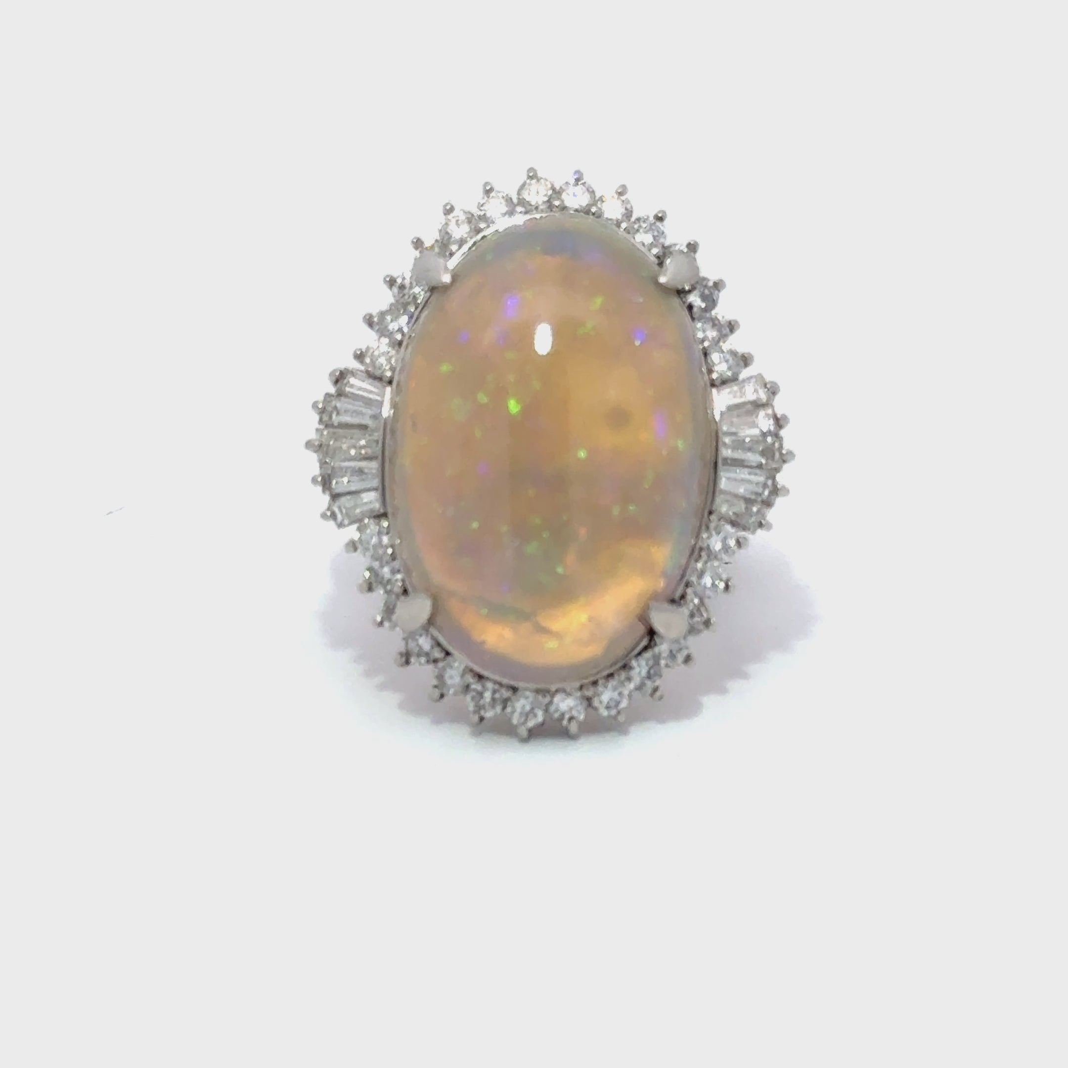 Oval Opal Surrounded By Diamonds