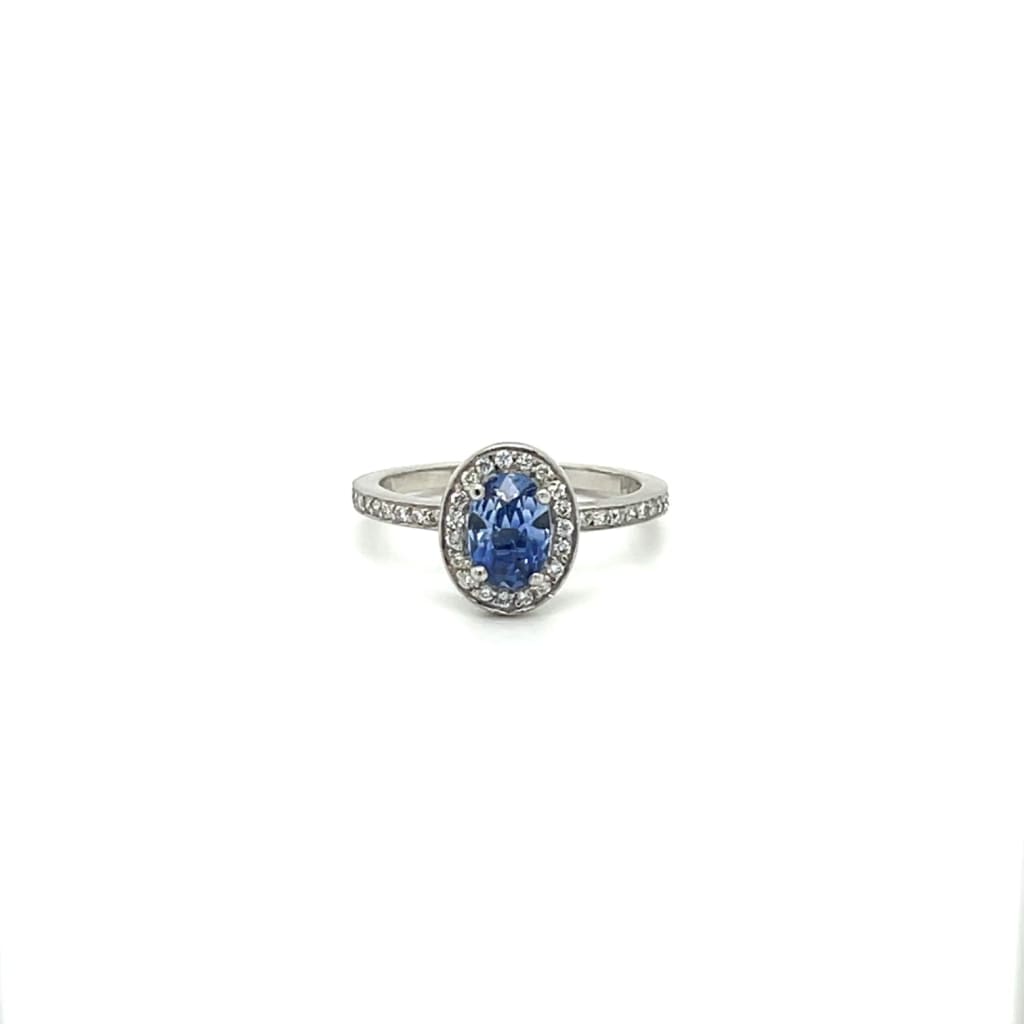 Sapphire Platinum Ring with Diamond Halo at Regard Jewelry