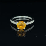 Load image into Gallery viewer, 1.35 CT YELLOW SAPPHIRE SET IN 18 KARAT WHITE GOLD WITH IDEAL CUT ACCENT DIAMONDS AT REGARD JEWELRY - Regard Jewelry
