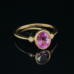 1 CT PINK SAPPHIRE SET IN 14 KARAT ROSE GOLD WITH 2 SMALL DIAMONDS AT REGARD JEWELRY IN AUSTIN, - Regard Jewelry