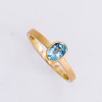 Load image into Gallery viewer, 18k Matte Yellow Gold Yumdrop Ring with a Oval Aquamarine by Kimberly Collins Colored Gems at Regard - Regard Jewelry
