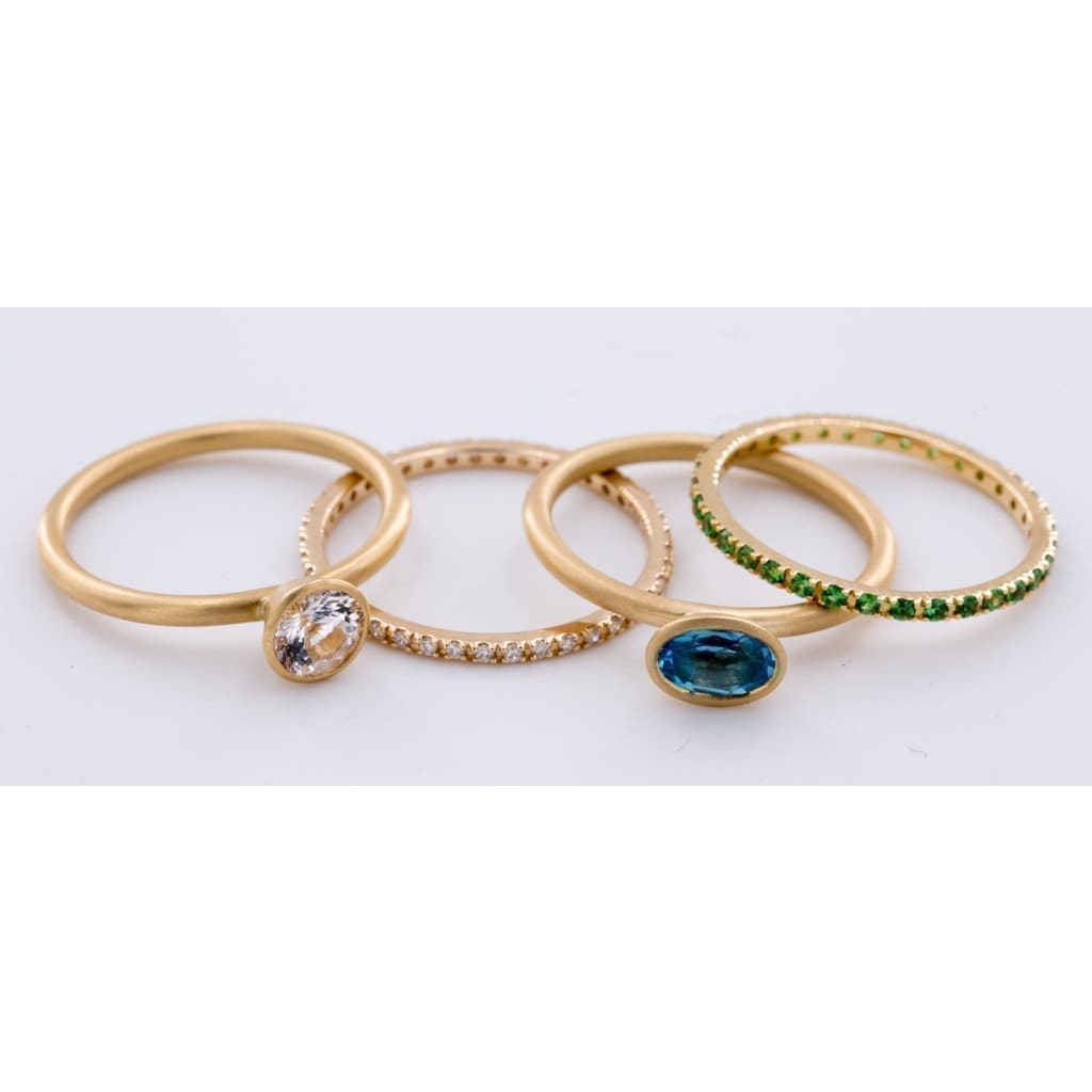 18k Matte Yellow Gold Yumdrop Ring with a Oval Blue Topaz by Kimberly Collins Colored Gems at Regard - Regard Jewelry
