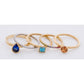 18k Matte Yellow Gold Yumdrop Ring with Round Orange Sapphire by Kimberly Collins Colored Gems at - Regard Jewelry