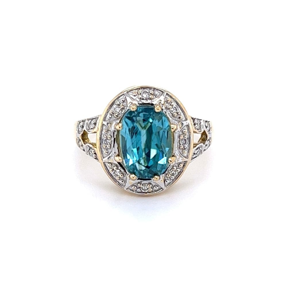 18k YG 3.76 ct Antique Cushion Blue Zircon Ring with Accent Diamonds at Regard Jewelry in Austin, Texas - Regard Jewelry