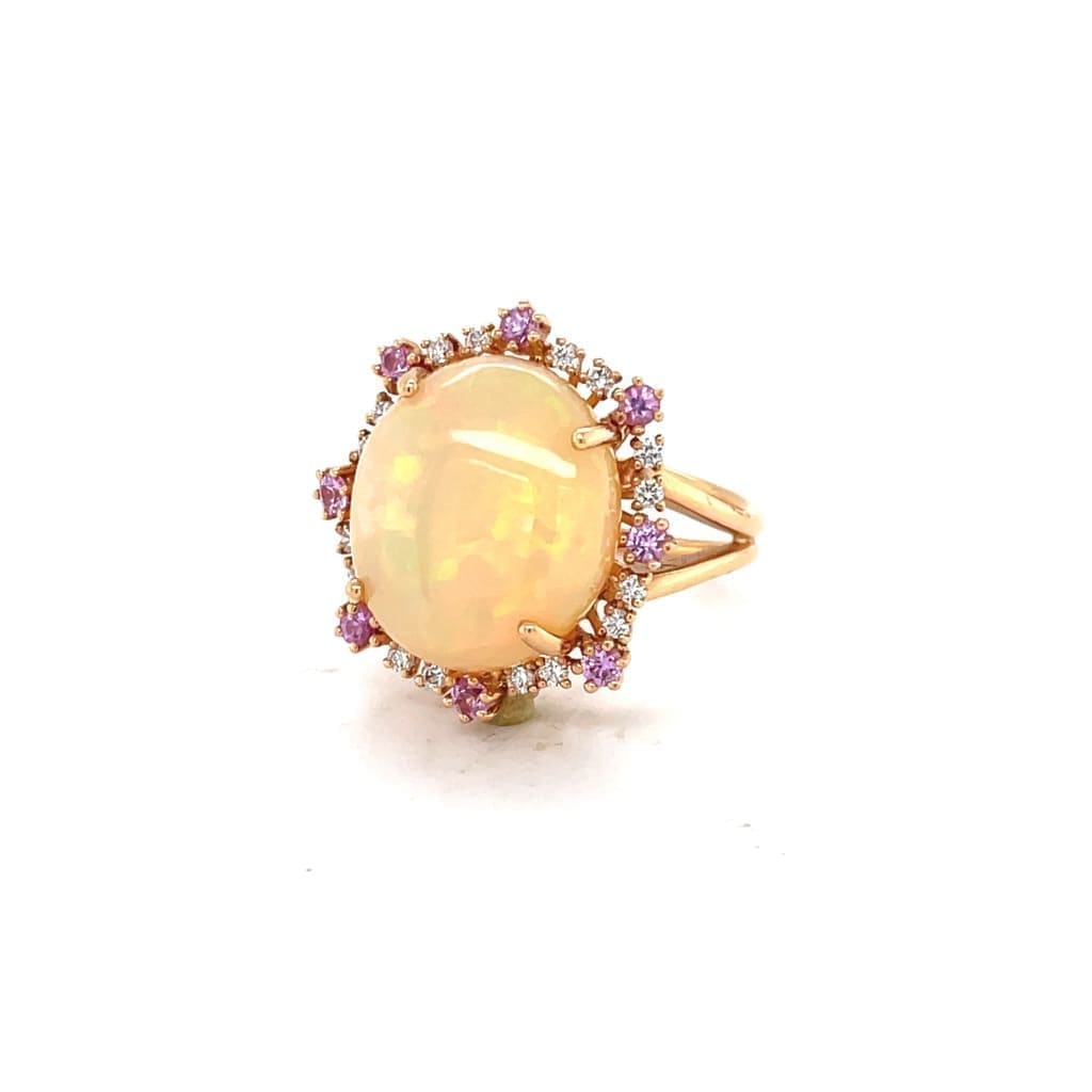 6.81 CT ETHIOPIAN OPAL 18 KARAT RING WITH DIAMOND AND SAPPHIRE ACCENT STONES AT REGARD JEWELRY IN - Regard Jewelry