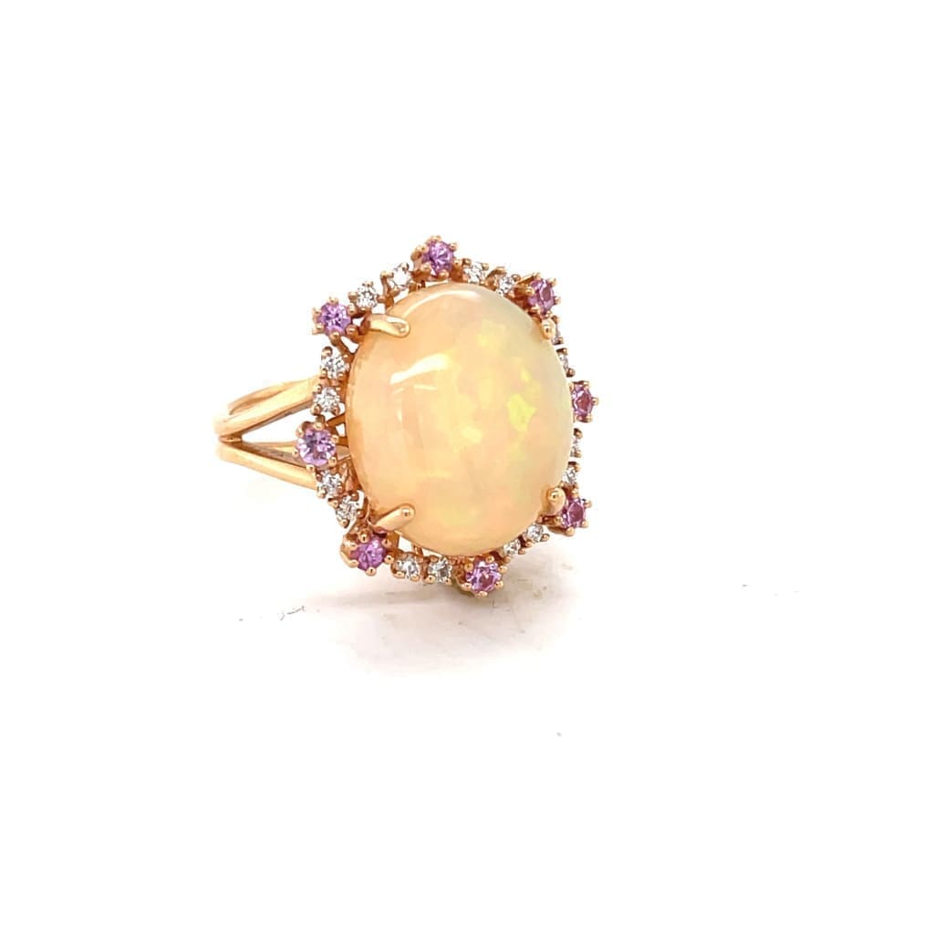 6.81 CT ETHIOPIAN OPAL 18 KARAT RING WITH DIAMOND AND SAPPHIRE ACCENT STONES AT REGARD JEWELRY IN - Regard Jewelry