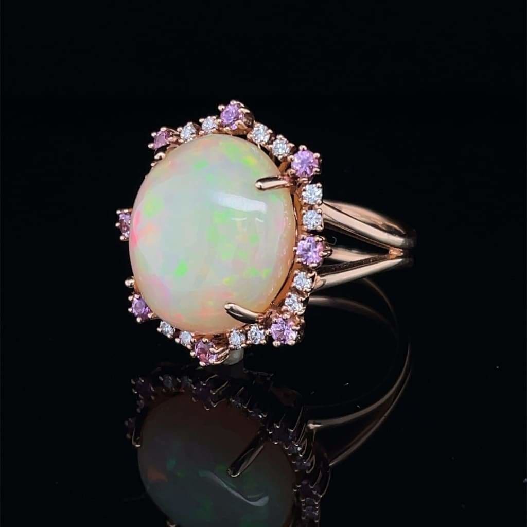 6.81 CT ETHIOPIAN OPAL 18 KARAT RING WITH DIAMOND AND SAPPHIRE ACCENT STONES AT REGARD JEWELRY IN - Regard Jewelry