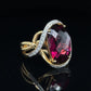 8.52 CT RHODOLITE GARNET WITH .14 CTTW OF ACCENT DIAMONDS SET IN AN 1K YELLOW GOLD RING AT REGARD - Regard Jewelry