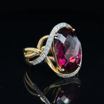 Load image into Gallery viewer, 8.52 CT RHODOLITE GARNET WITH .14 CTTW OF ACCENT DIAMONDS SET IN AN 1K YELLOW GOLD RING AT REGARD - Regard Jewelry
