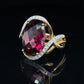 8.52 CT RHODOLITE GARNET WITH .14 CTTW OF ACCENT DIAMONDS SET IN AN 1K YELLOW GOLD RING AT REGARD - Regard Jewelry