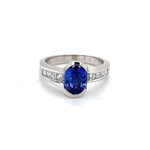 Load image into Gallery viewer, .90 CT TANZANITE WITH ACCENT DIAMONDS SET IN 18 KARAT WHITE GOLD AT REGARD JEWELRY IN AUSTIN, TEXAS - Regard Jewelry
