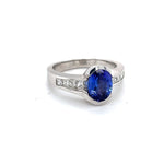 Load image into Gallery viewer, .90 CT TANZANITE WITH ACCENT DIAMONDS SET IN 18 KARAT WHITE GOLD AT REGARD JEWELRY IN AUSTIN, TEXAS - Regard Jewelry
