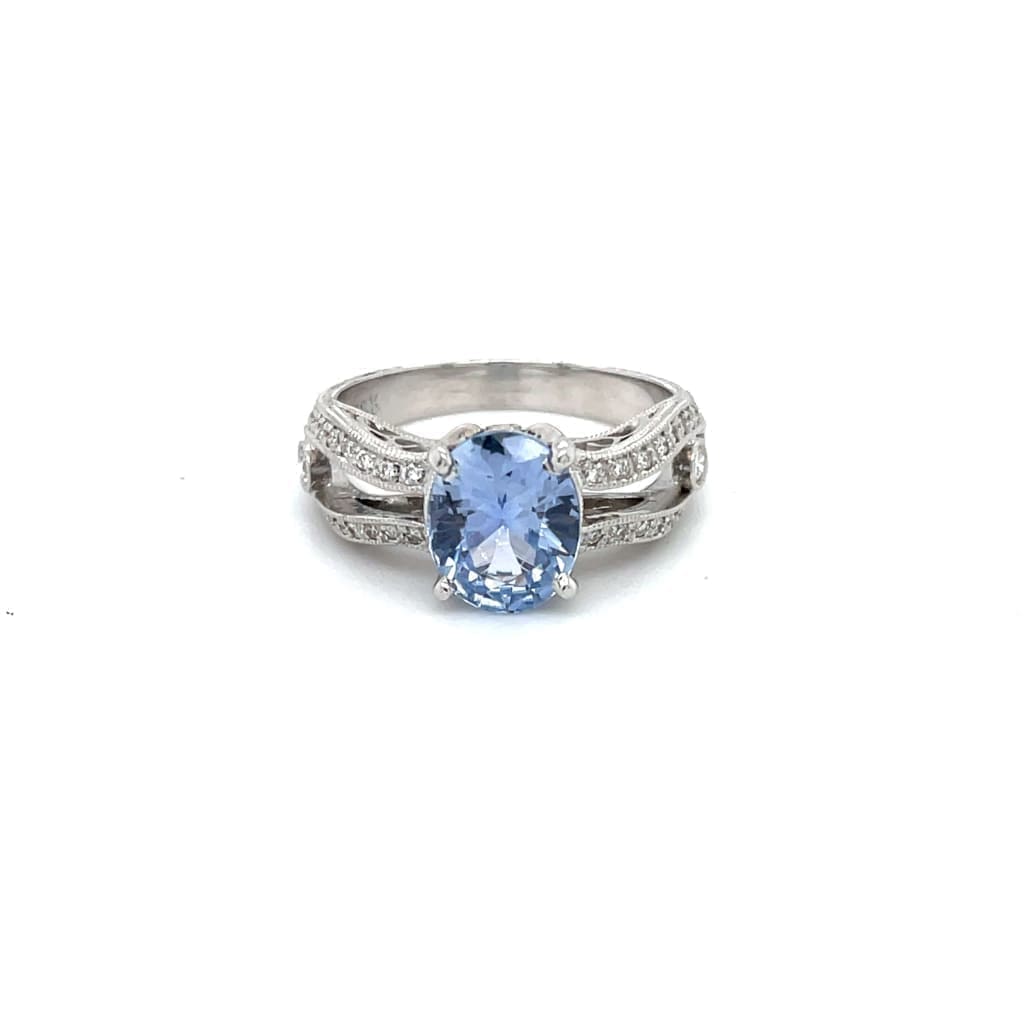 Amazing Oval 1.28 ct Blue Sapphire Set in a 18k white gold Ring with .33 cttw Accent Diamonds at - Regard Jewelry