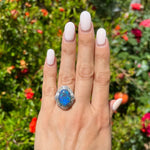 Load image into Gallery viewer, Beautiful Black Opal Set in Platinum Ring with Diamond Halo at Regard Jewelry in Austin, Texas - Regard Jewelry
