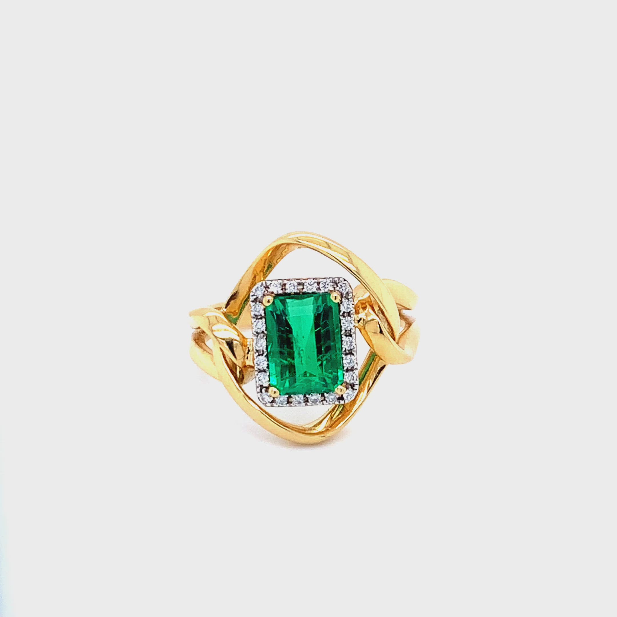 18K YELLOW GOLD WITH A 1.47CT EMERALD AND DIAMONDS IN AUSTIN, TX.
