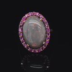 Load and play video in Gallery viewer, 8ct Opal with Sapphire Halo Ring at Regard Jewelry in Austin, TX
