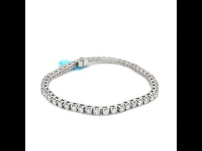 6.02 CTTW NATURAL DIAMOND TENNIS BRACELET SET IN 14 KARAT WHITE GOLD AT REGARD JEWELRY IN AUSTIN,