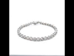 Load and play video in Gallery viewer, 7.00 CTTW NATRUAL DIAMOND 3 PRONG TENNIS BRACELET SET IN 14 KARAT WHITE GOLD AT REGARD JEWELRY IN
