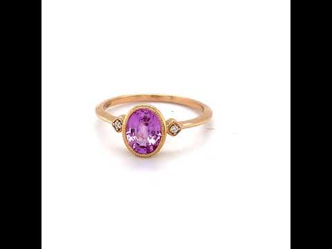 1 CT PINK SAPPHIRE SET IN 14 KARAT ROSE GOLD WITH 2 SMALL DIAMONDS AT REGARD JEWELRY IN AUSTIN,