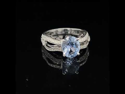1.28 ct Sapphire Set in 18 K White Gold Ring With .33 cttw Accent Diamonds at Regard Jewelry in Austin, Texas