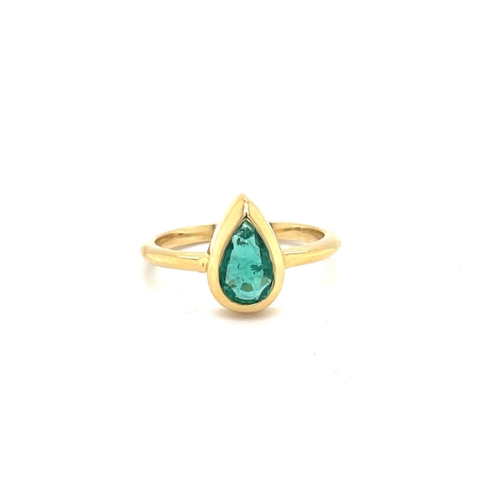 Pear Shape Emerald Set in 14K Yellow Gold Bezel Ring at Regard Jewelry in Austin, Texas - Regard Jewelry