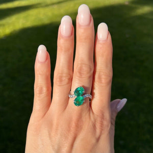 Platinum Oval Emerald Bypass Ring and Diamonds at Regard Jewelry in Austin, Texas - Regard Jewelry