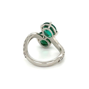 Platinum Oval Emerald Bypass Ring and Diamonds at Regard Jewelry in Austin, Texas - Regard Jewelry