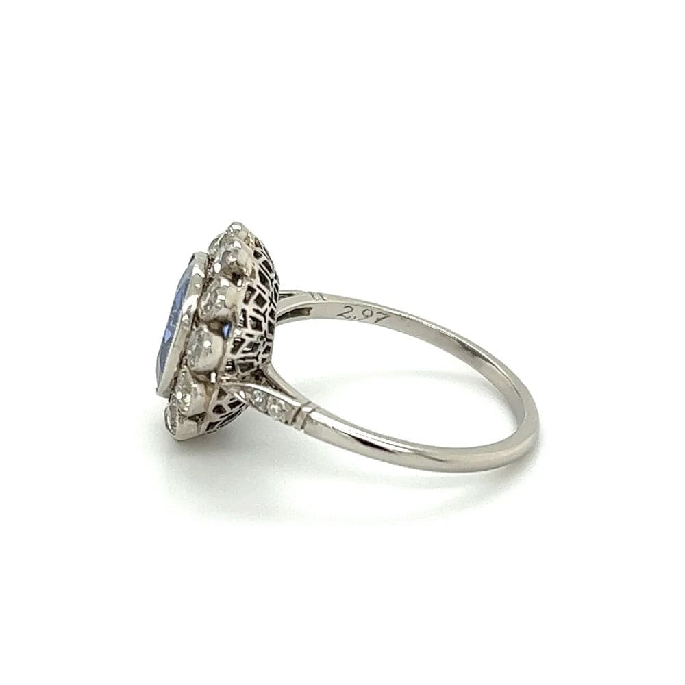 Platinum Ring With Oval Sapphire and Diamond Halo at Regard