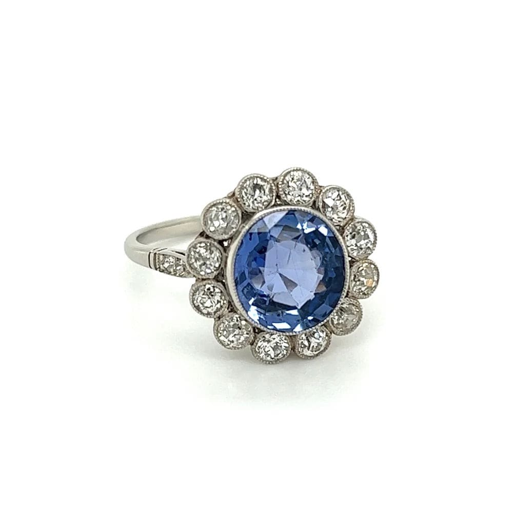 Platinum Ring With Oval Sapphire and Diamond Halo at Regard
